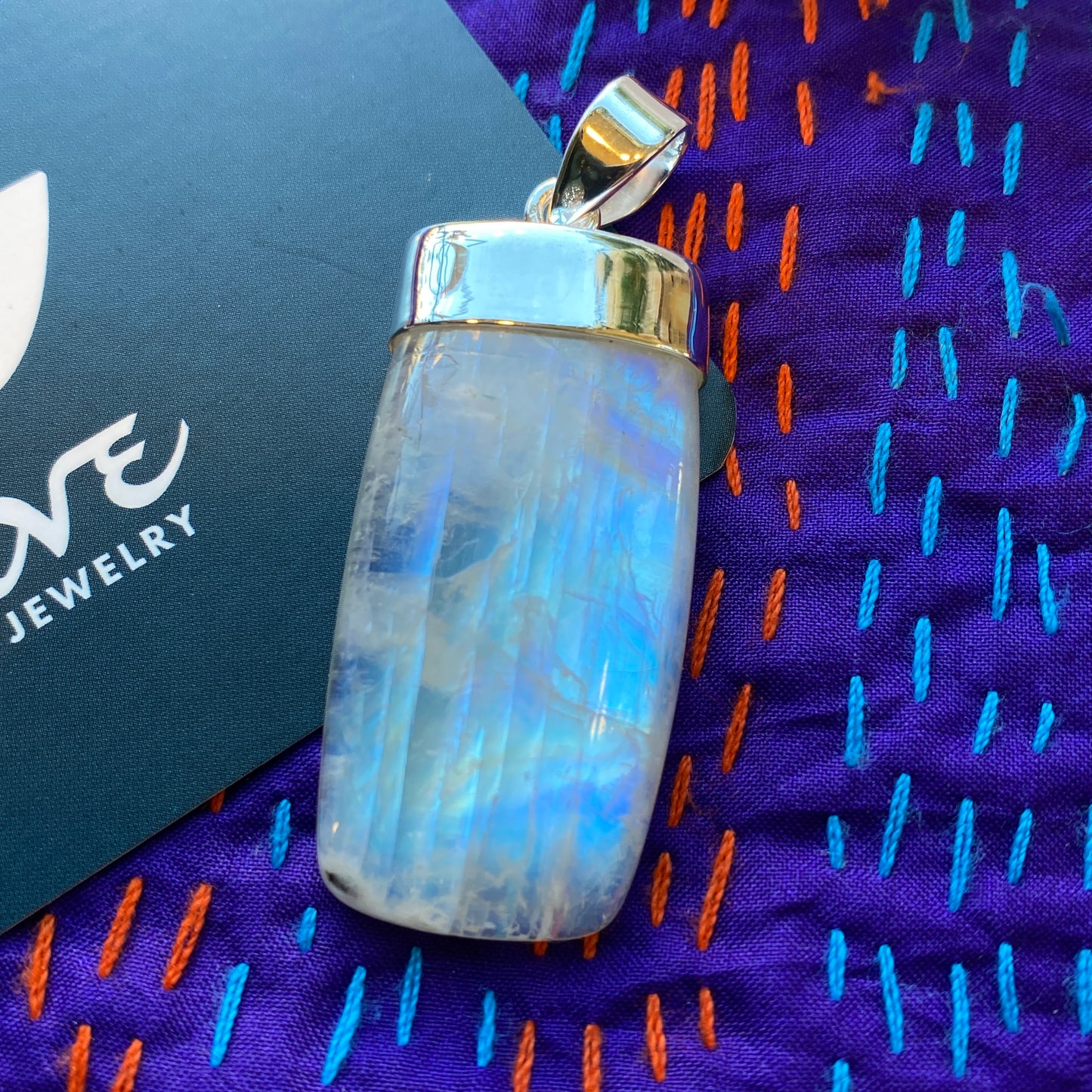 Rainbow Moonstone Capped Pendants